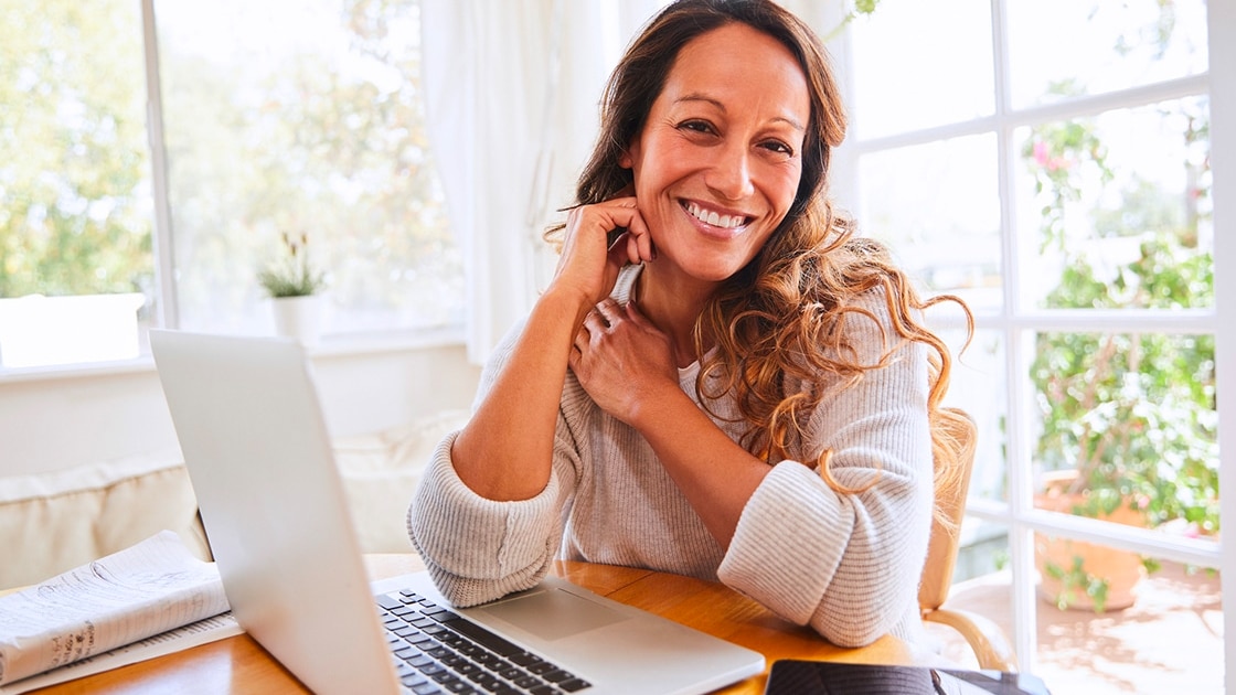 lady behind desk at computer