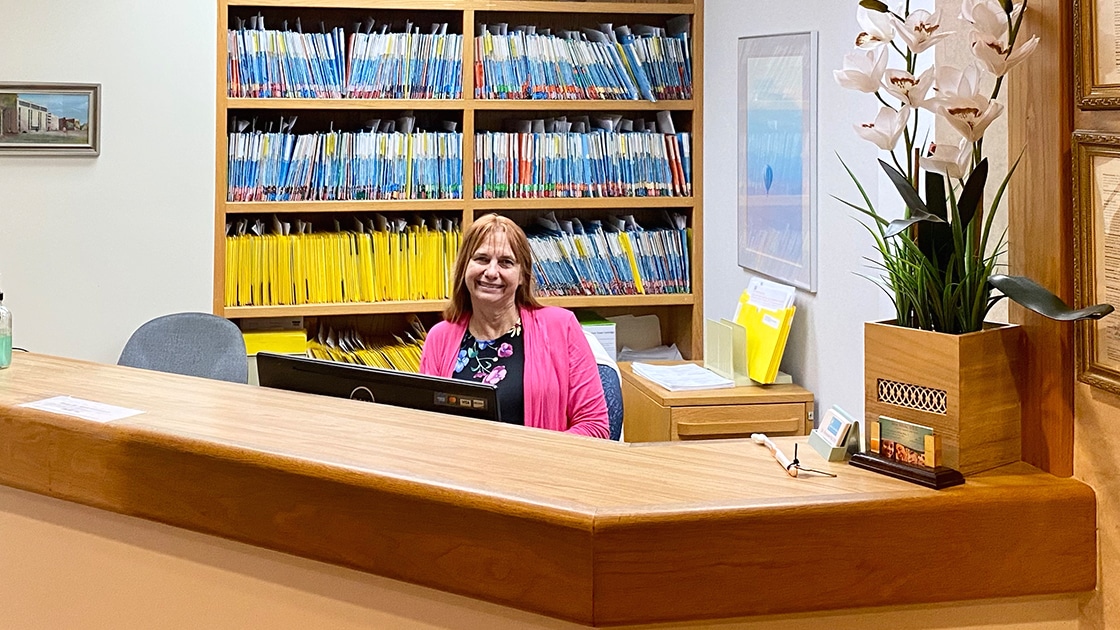 lady behind desk